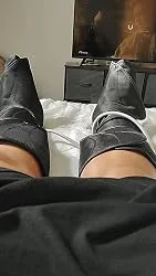 Uploaded photo of full-leg compression boots being worn at home