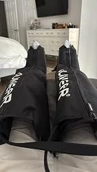 Uploaded photo of full-leg compression boots being worn at home