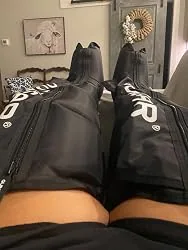 Uploaded photo of full-leg compression boots being worn at home